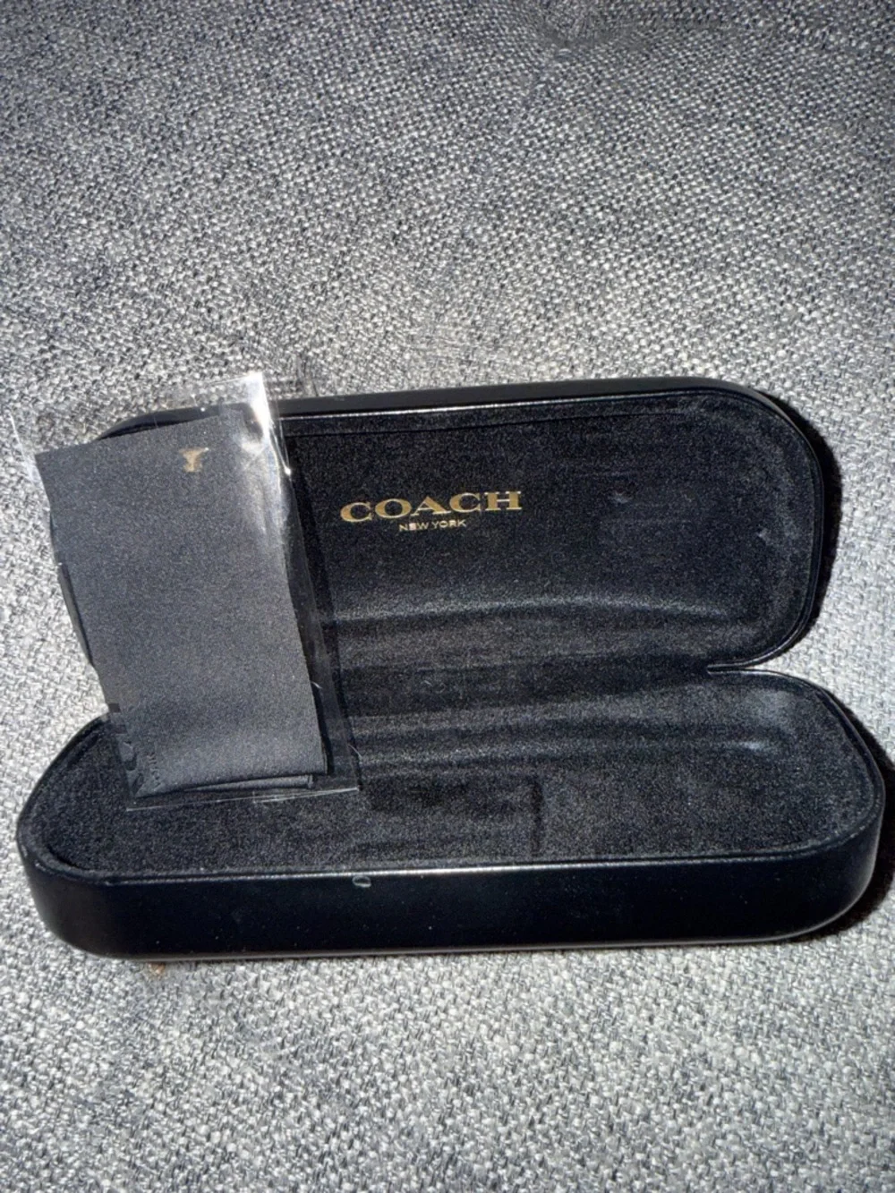 Coach black hard clamshell sunglass case